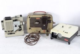 Three projectors including a Kodak Brownie portable Eight-58 Projector, a Noris H12 no.