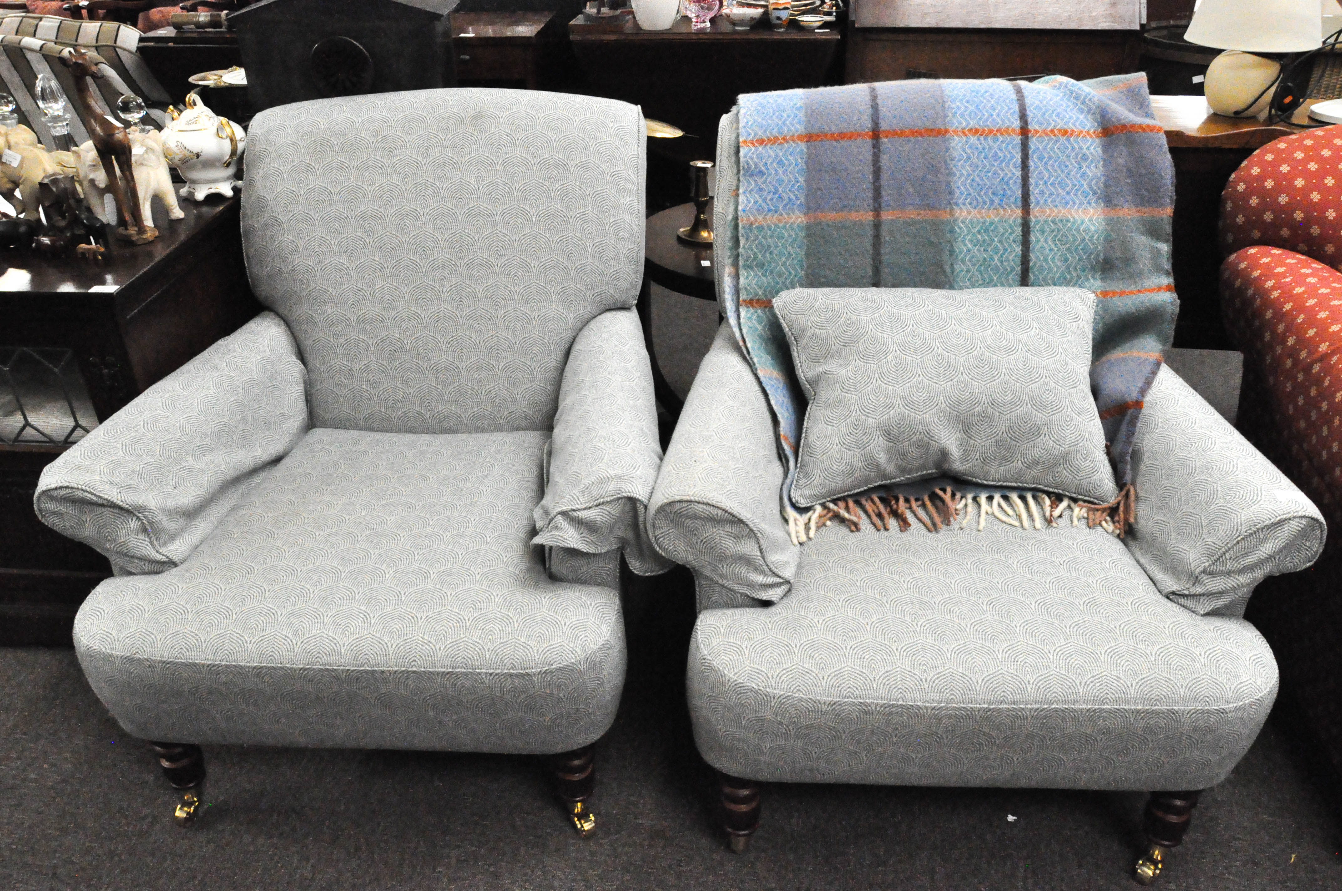 A pair of contemporary Multiyork armchairs upholstered in blue and white,