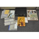 A briefcase containing musical scrapbooks relating to the Silver Ring Choir and more