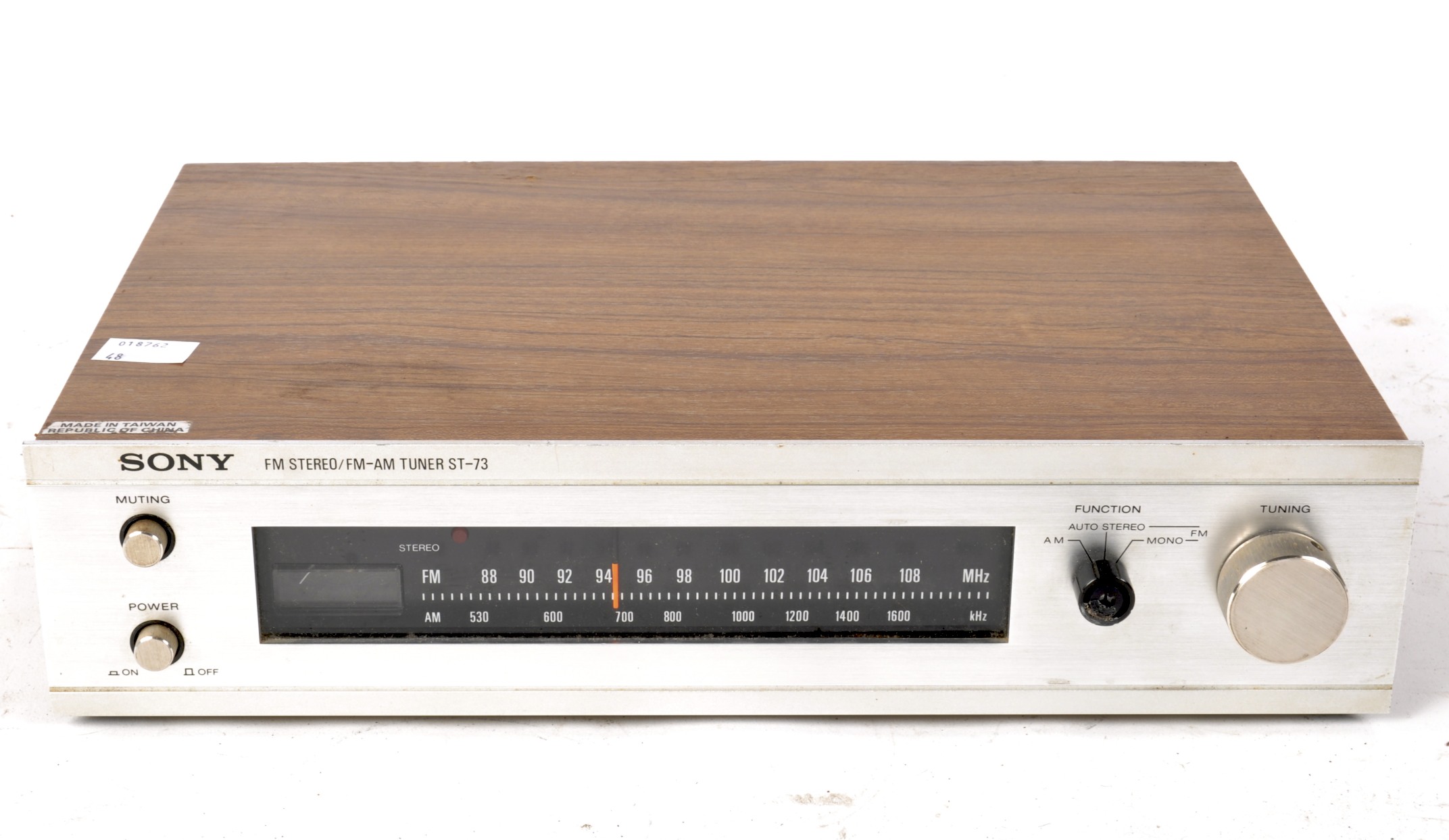 A 1970's Retro Sony Stereo FM/AM tuner ST-73, in part wooden veneered case,