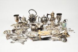A large quantity of silver plate, including a cigar case, dishes, lighters, teapots,