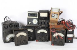 A box of various meters including a Universal Avometer, an Avo Allwave Oscilator,
