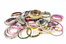 A selection of costume jewellery, mostly assorted bangles,
