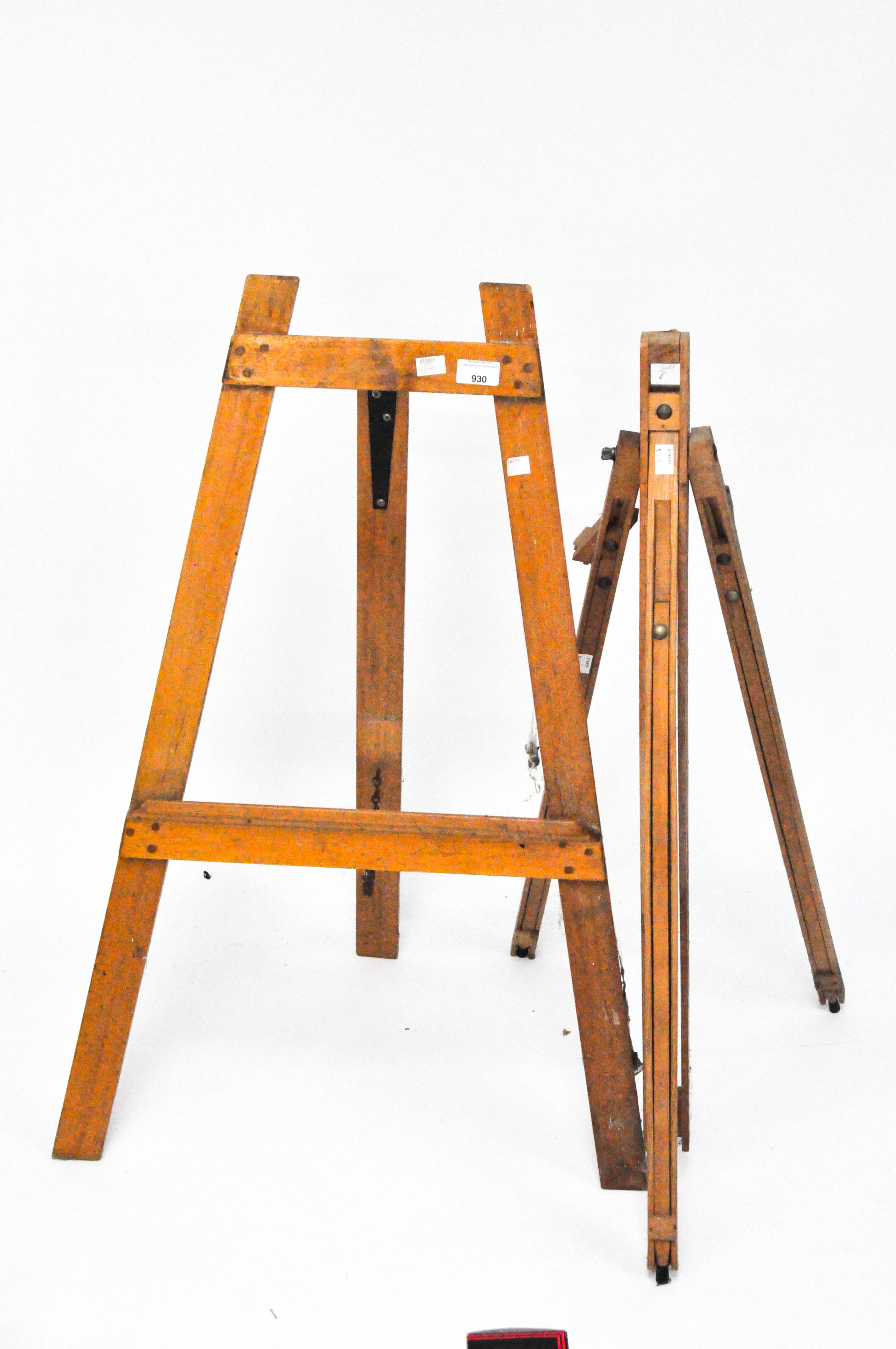 Two wooden folding easels