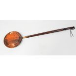 A late 19th/early 20th century copper bed pan,