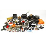 A collection of Action Man toys and accessories, including three figures, a Jeep with trailer,