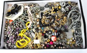 A selection of costume jewellery, including bracelets, earrings, beads,