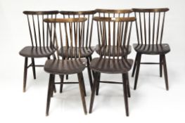 A set of six Czech Republic mid-century spindle back chairs on lightly tapered legs,