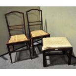 Two early 20th century mahogany inlaid chairs with wicker seats, with upholstered stool