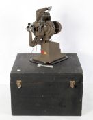 A Bell and Howell projector, bearing label for Morland Howell Braithwaite Ltd,