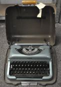 An Imperial Good Companion 4 typewriter, 1960, in sea-foam green,