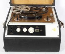 A vintage Brennell reel to reel to recorder, marked Stern's Type CS to the black and gold dial,