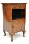 A late 19th/early 20th century mahogany bedside cabinet, raised on cabriole legs,