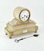 A early 20th Century alabaster mantel clock, on a plinth base with gilt details,