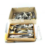 A large quantity of silver plate, including a set of 'Gem Silver' spoons, bakelite handled knives,