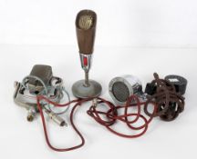 A group of microphones, to include a WWII example