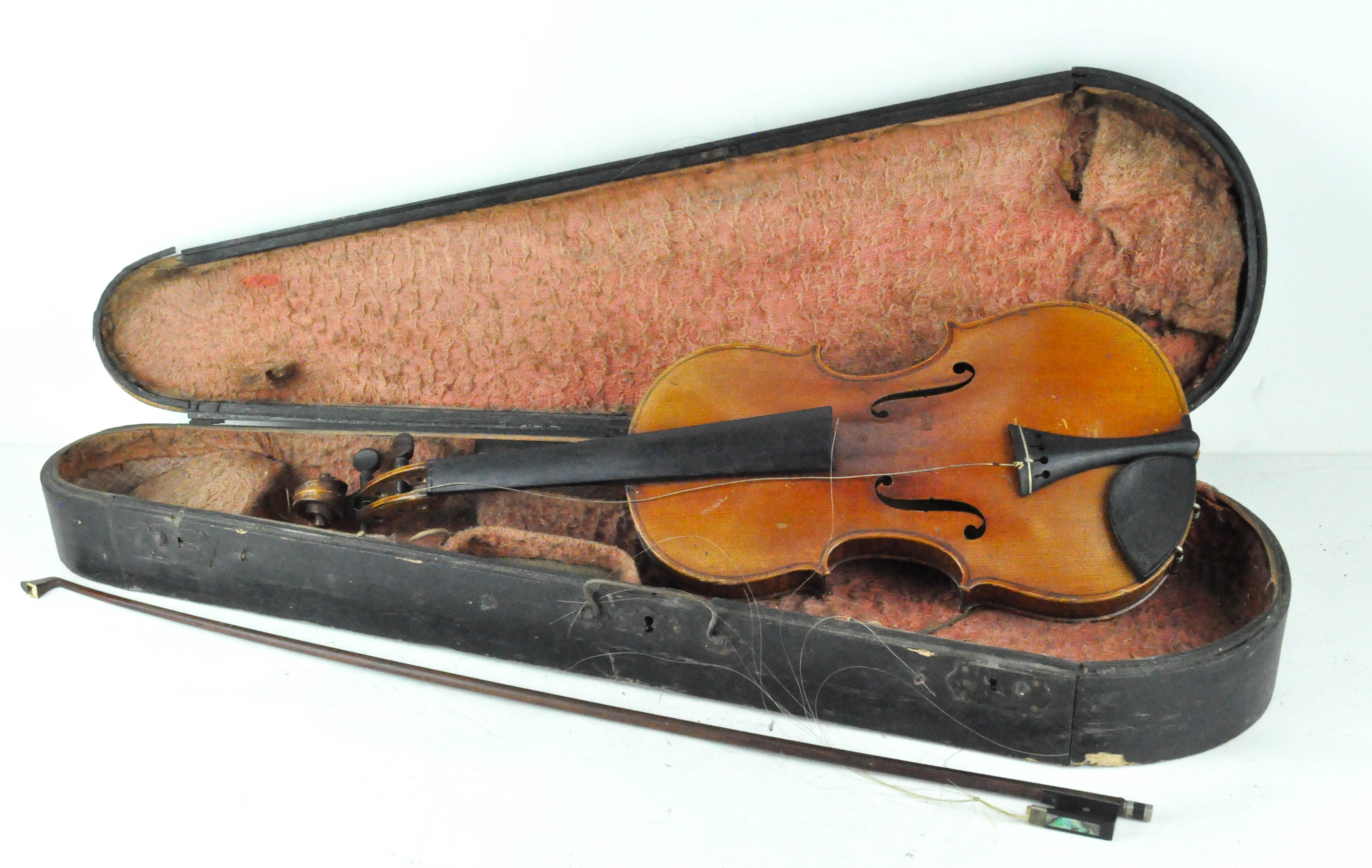 An early 20th century violin with bow,