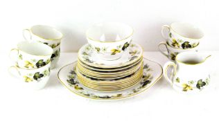 A Royal Doulton 'Larchment' pattern tea set, comprising six cups, saucers and side plate,