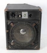 A Woofer acoustic transducer 75 watt, within a leatherette case, metal mesh to the front,