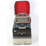 A Remington Rand typewriter, together with three others including an Olympia,