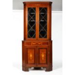 A Sheraton style mahogany corner cabinet,