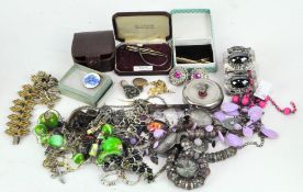 A selection of costume jewellery, including a silver Regnum tie clip in the original box, earrings,