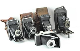 A selection of vintage cameras, comprising three Kodaks, a 'King Penguin' and more,