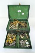 A collection of vintage costume jewellery including earrings, brooches and more,