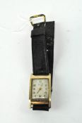 A Verity wristwatch, silvered dial with Arabic numerals, yellow metal case,
