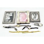 Three 20th Century silver plated photo frames,