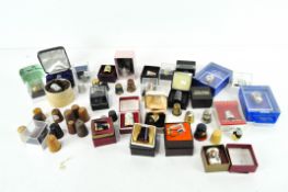A large collection of 20th & 21st Century thimbles, including five brass, one brass and leather,