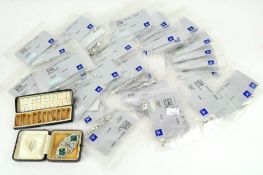 A box of Swarovski crystal samples, of assorted sizes and designs,