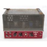 A Northcourt Thirty portable value amplifier, with red mirrored dial,