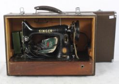 A Singer 99k electric sewing machine, EJ149645, mounted on a mahogany base,