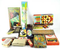 A collection of assorted vintage board games and other games, including table tennis, dominoes,