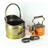 A brass kettle together with a coal bucket