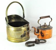 A brass kettle together with a coal bucket