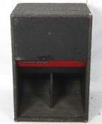 A large Cerwin Vega B-36-MF bass speaker, supported on wheels,