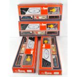 Four Lima OO gauge train sets, 4007A, containing a monitor, freight stock and track,