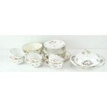 A Mintons part tea service, comprising six cups, saucers and small plates, a serving plate,
