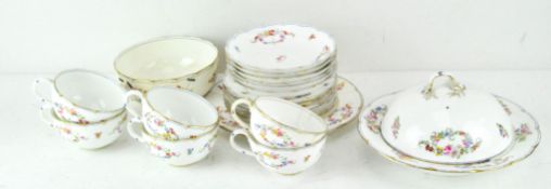 A Mintons part tea service, comprising six cups, saucers and small plates, a serving plate,