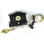 A late 19th century French Jules Rolez Ltd Paris black slate mantel clock