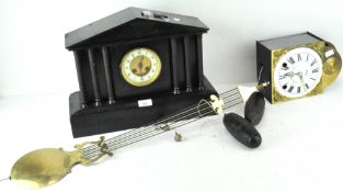 A late 19th century French Jules Rolez Ltd Paris black slate mantel clock