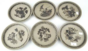 A set of six Poole Pottery limited edition stoneware plates, featuring native British birds,