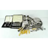 A large collection of silver plated wares, to include a toast rack, trophies, flatware and more,