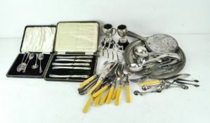 A large collection of silver plated wares, to include a toast rack, trophies, flatware and more,