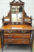A Victorian mahogany dressing table with overmantle, two short over two long drawers, beaded edges,