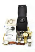 A collection of assorted modern gents wristwatches,