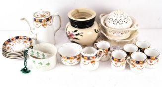 Collection of contemporary ceramics, including cream ware dishes and bowls,