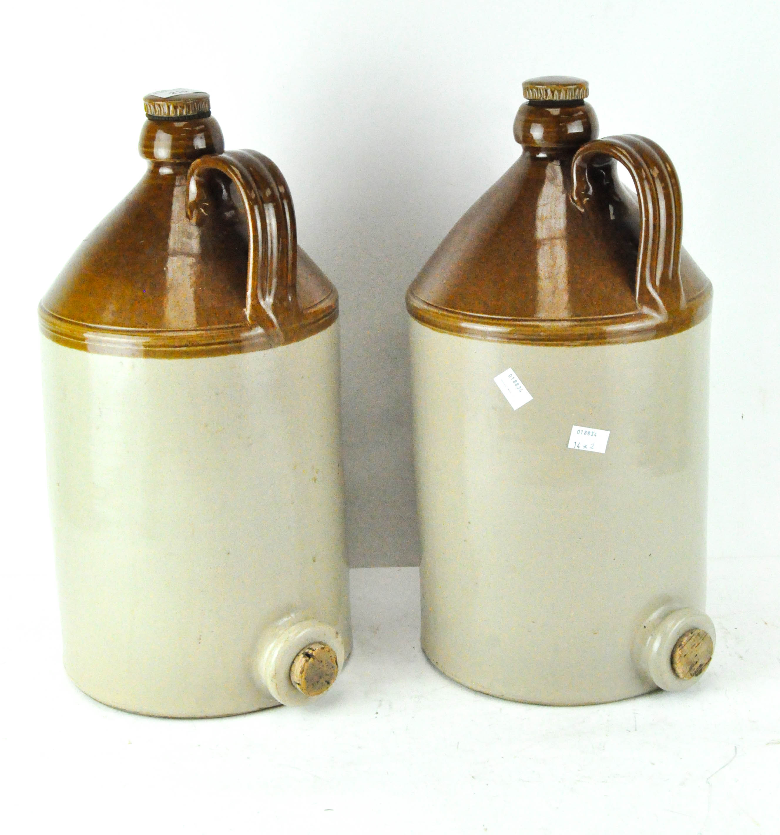 Two glazed stoneware flagons,